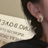 S925 sterling silver Korean version, niche design, photosensitive surface texture, Korean-style earrings, simple and individual Korean-style earrings and stud earrings details Picture